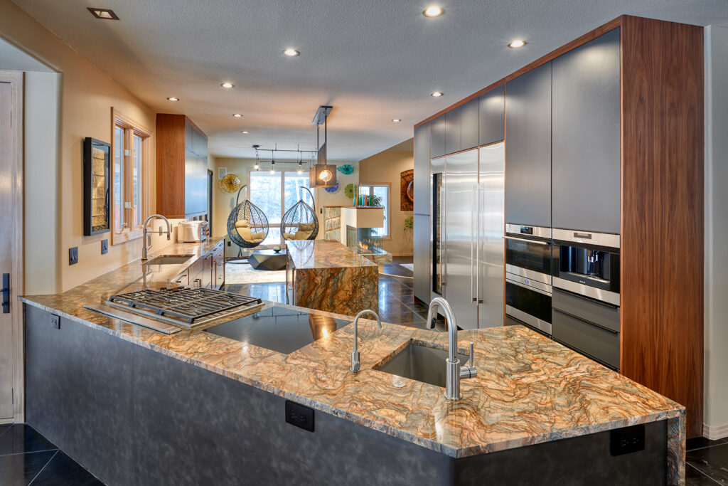 Modern kitchen design with luxury quartz countertop and gray cabinets
