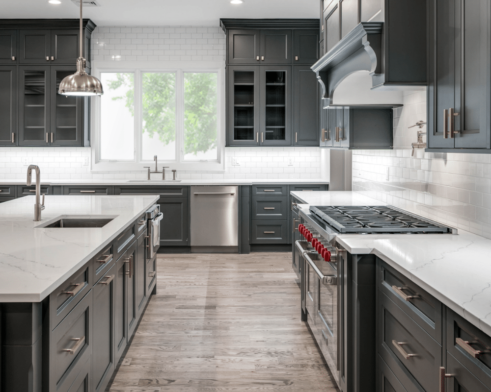 St. Martin dark grey kitchen cabinets in white countertop