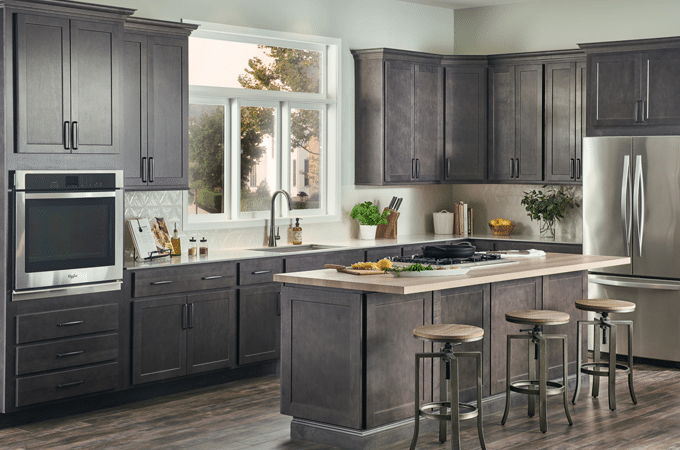 Wolf Dark grey kitchen with white countertop and light oak kitchen island