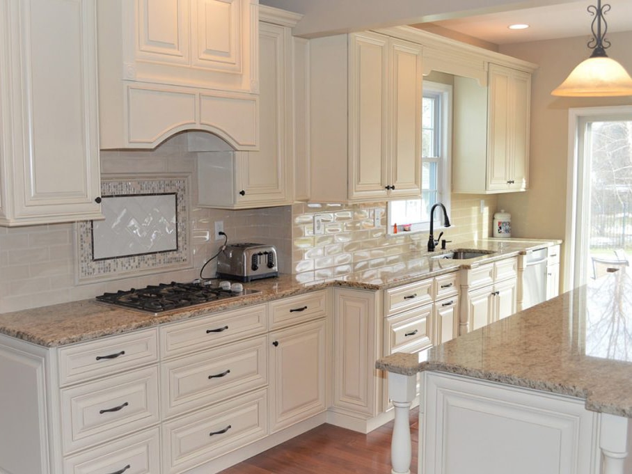 Spacious cream kitchen design with beige countertop