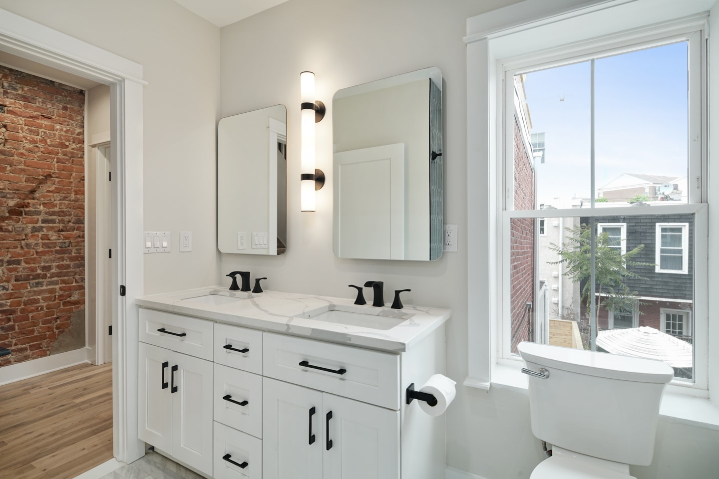 White small bathroom with double sink cabinet
