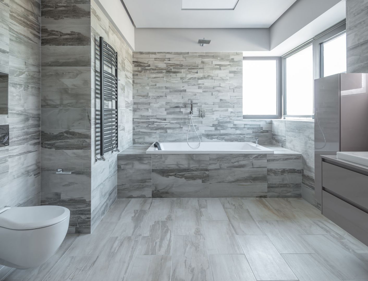 Luxury grey bathroom with grey bathroom cabinet