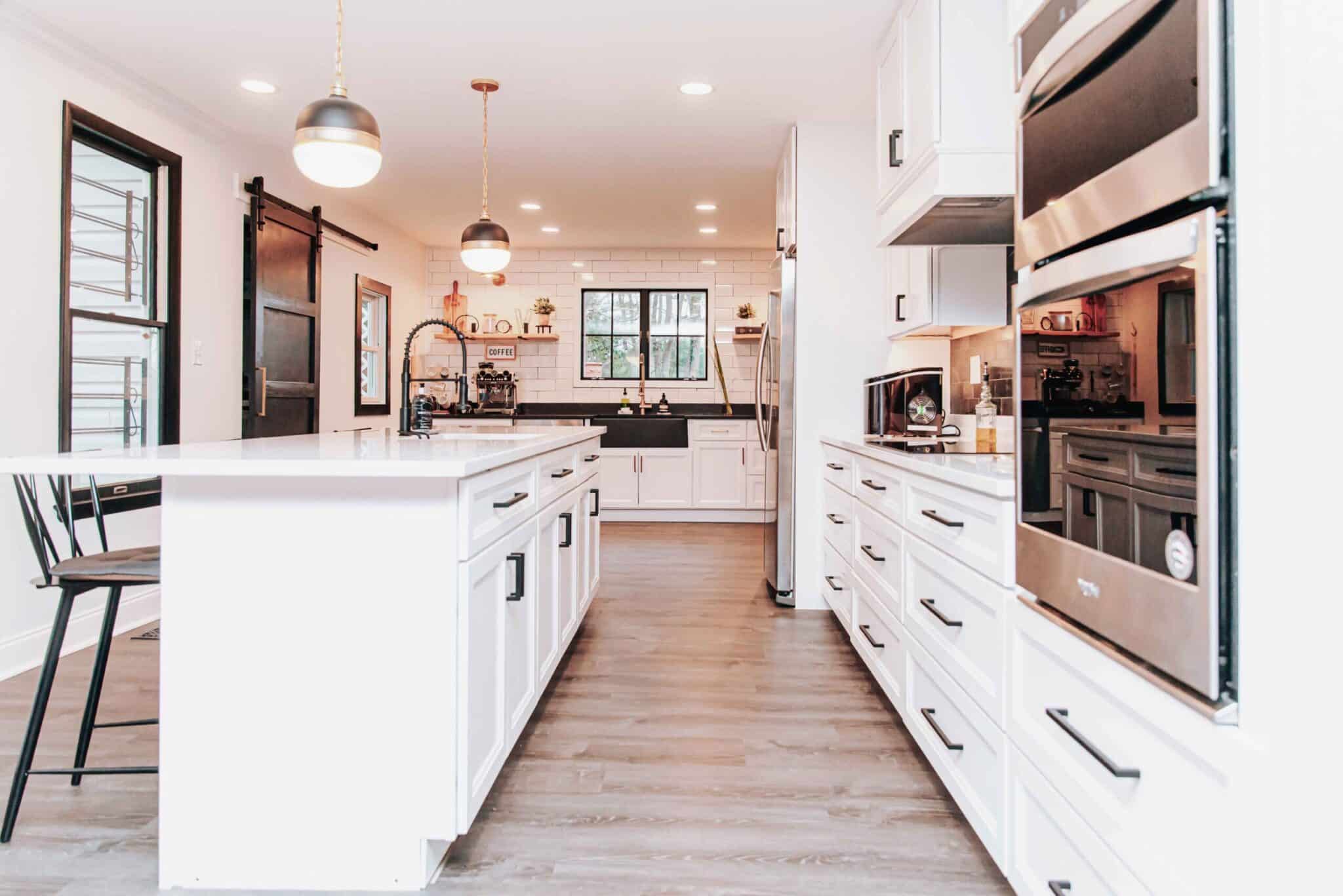 Tribeca white kitchen cabinets with white countertops