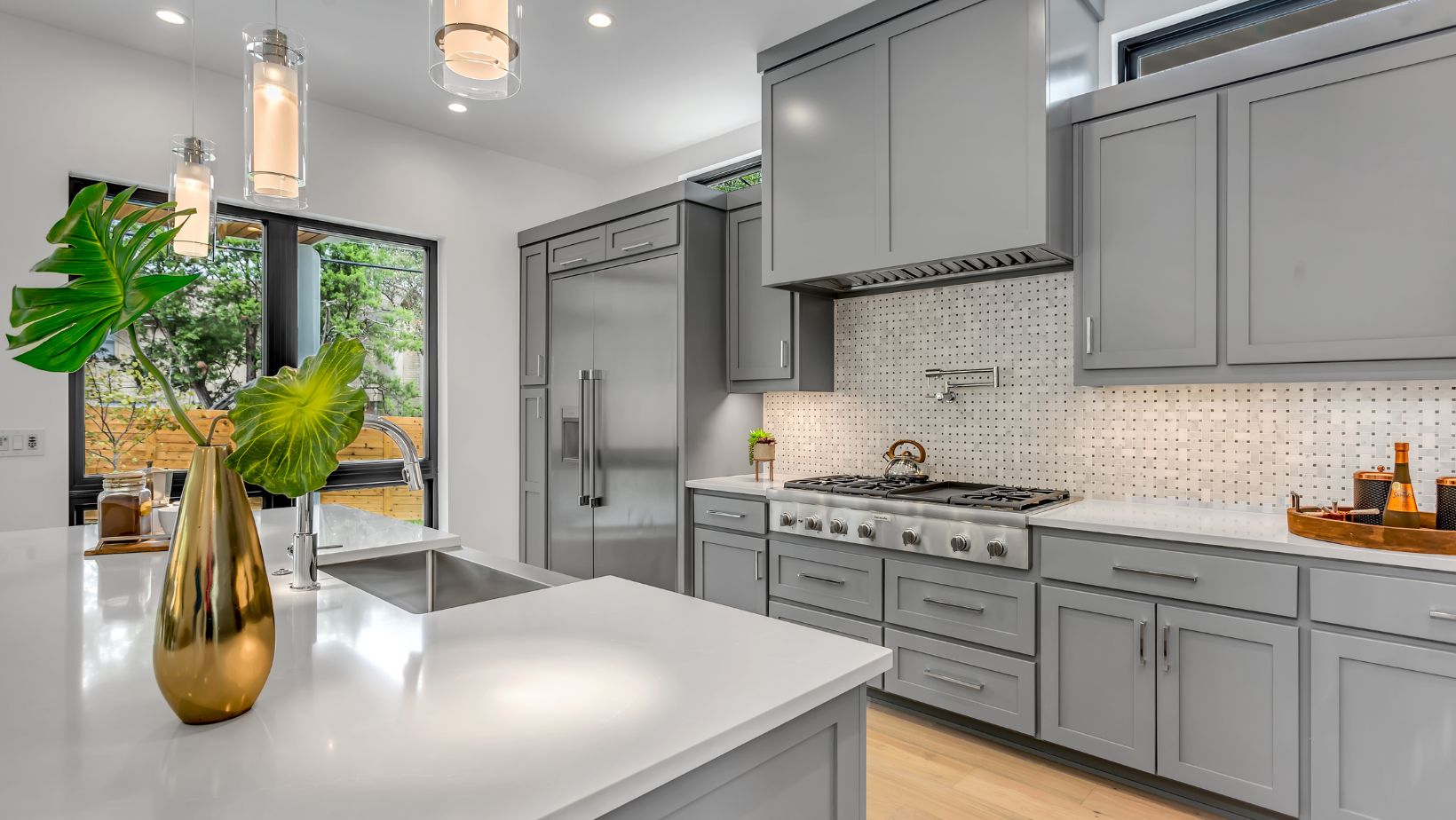 Grey Kitchen cabinet with white countertop