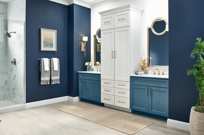 White and blue bathroom theme with double sink vanity