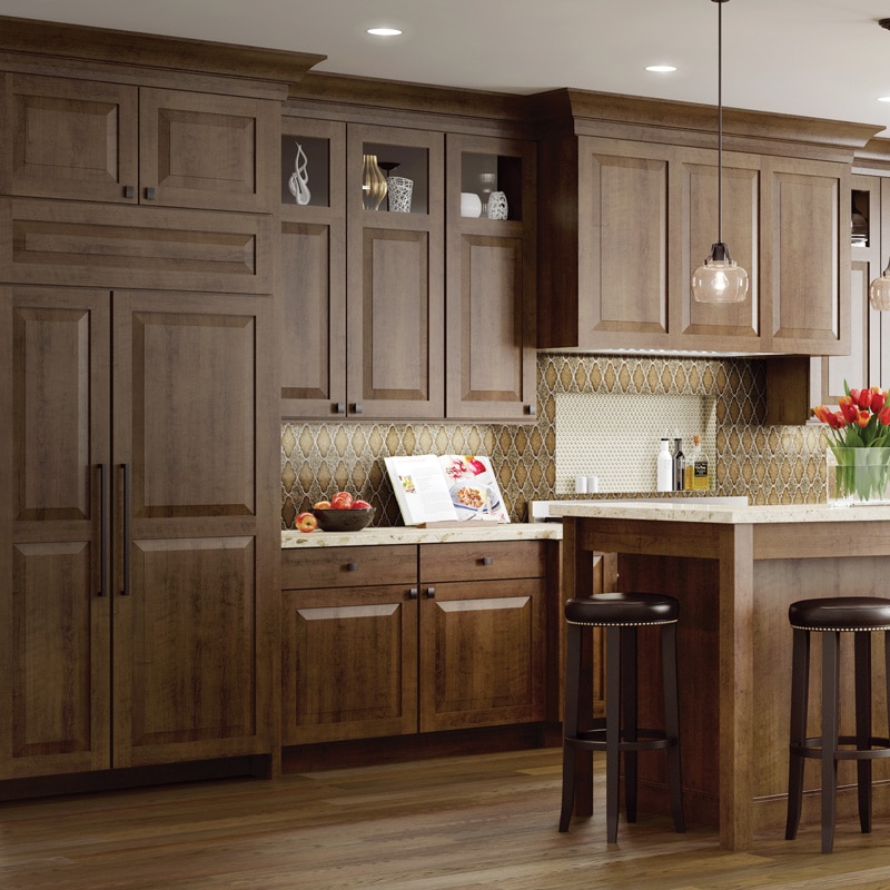 Woodland dark brown kitchen cabinets with cream countertop