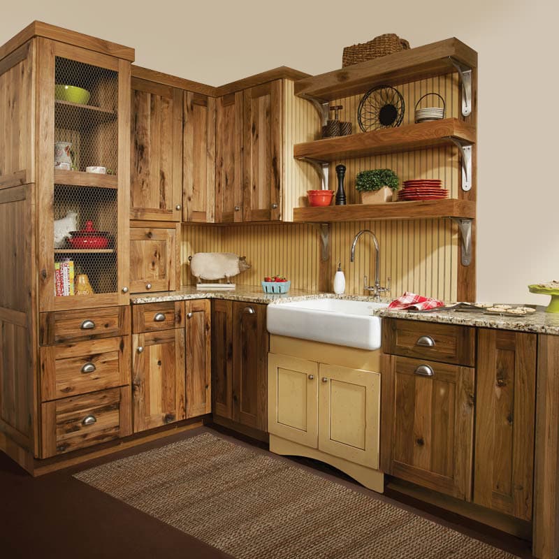 Woodland wood kitchen cabinets with granite countertops