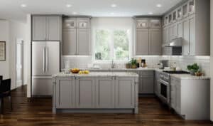 CNC Light grey traditional kitchen cabinets with white countertops