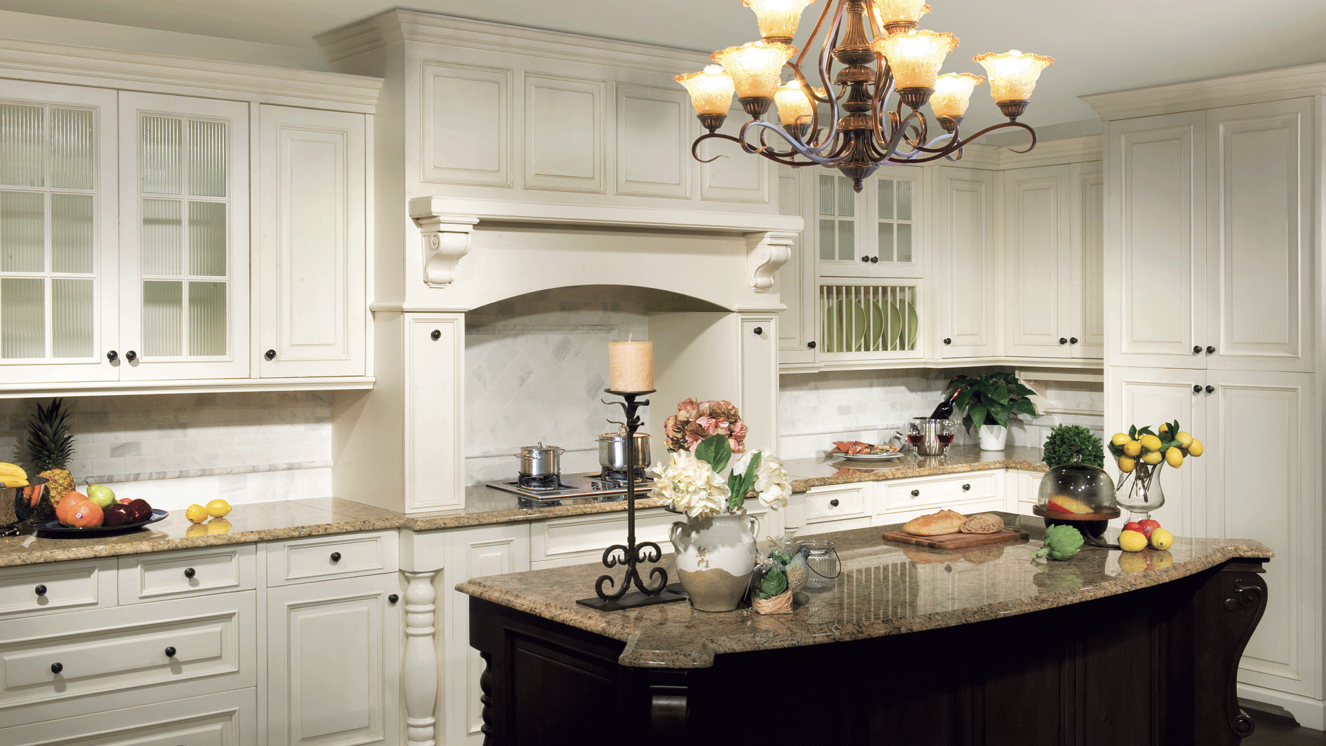 St. Martin cream kitchen cabinets with grey countertops
