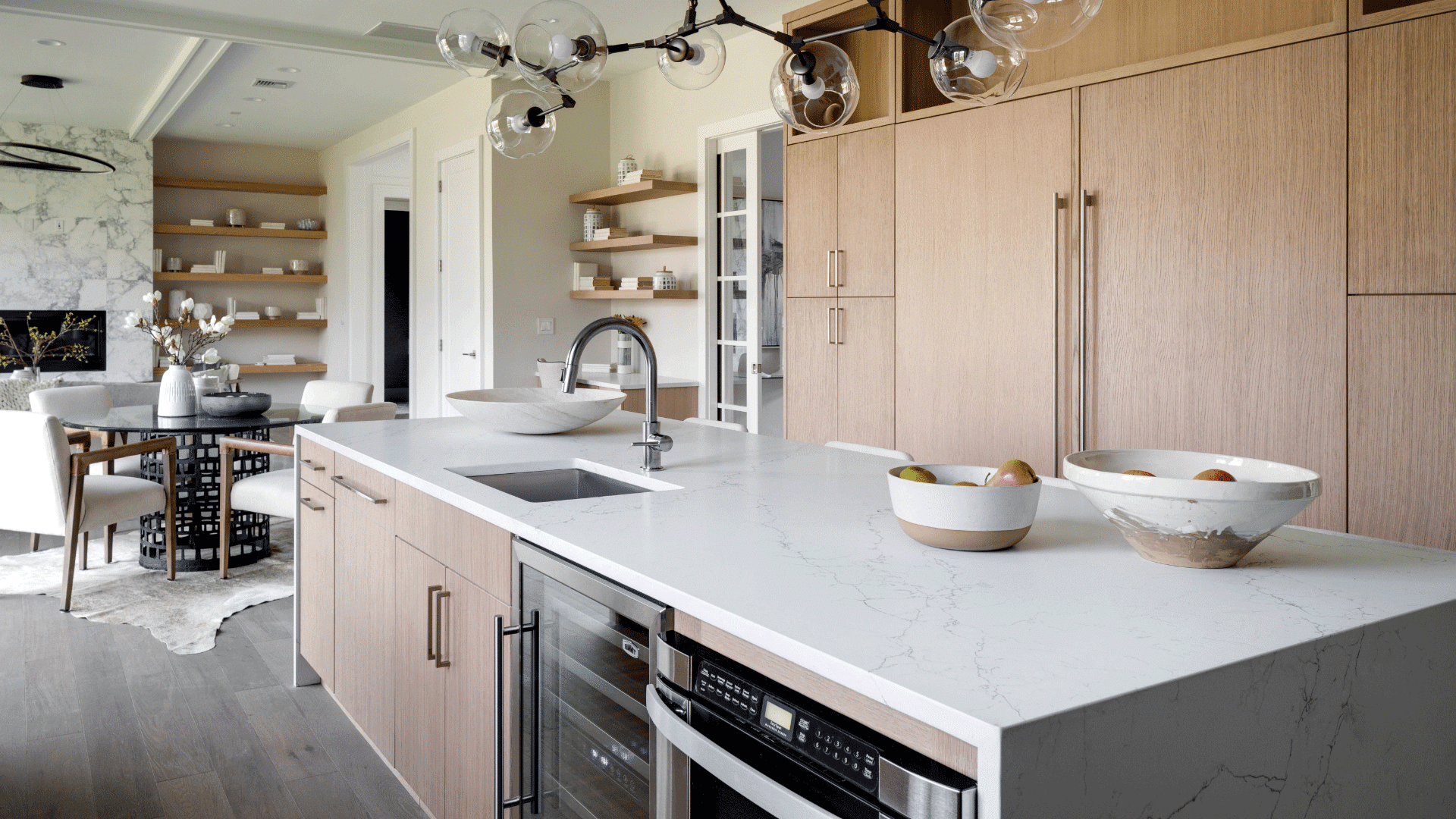 St. Martin brown kitchen cabinets with white countertop
