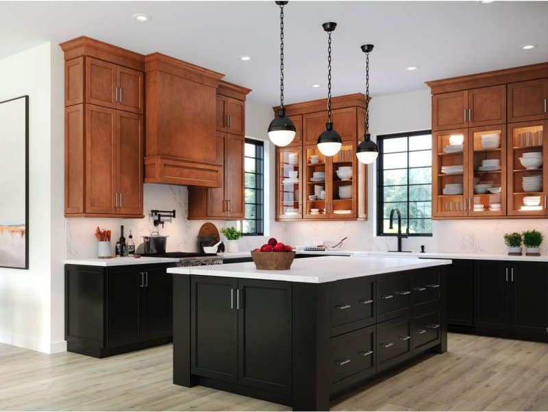 Waypoint black and brown kitchen cabinets with white countertops