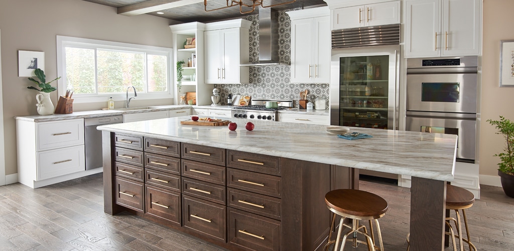 Wolf brown kitchen cabinets with white countertops