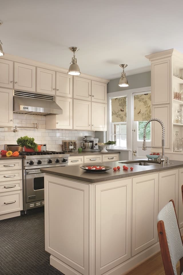 Wolf cream kitchen cabinets with grey countertops