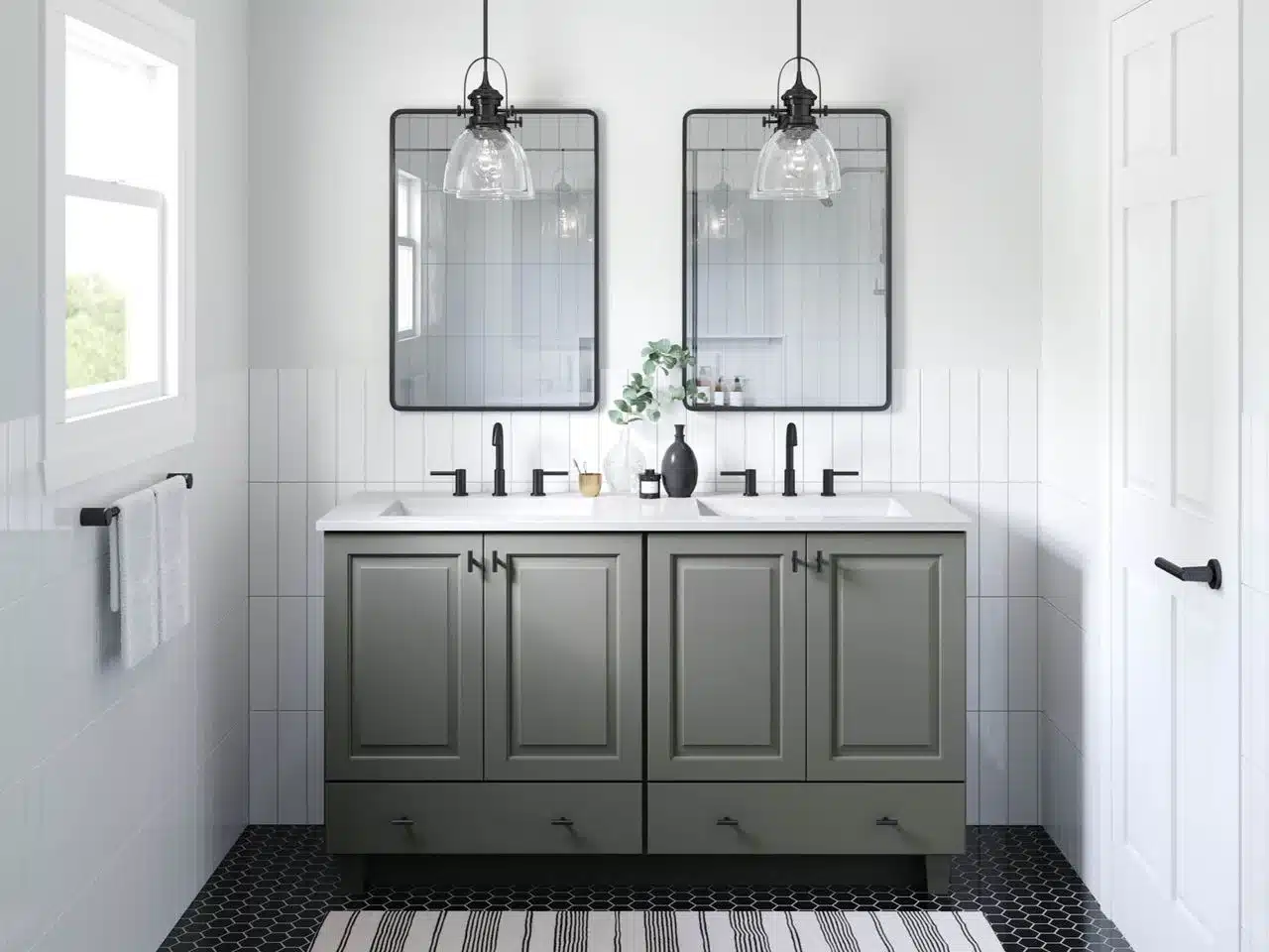 White bathroom with dark grey bathroom cabinets and white countertop