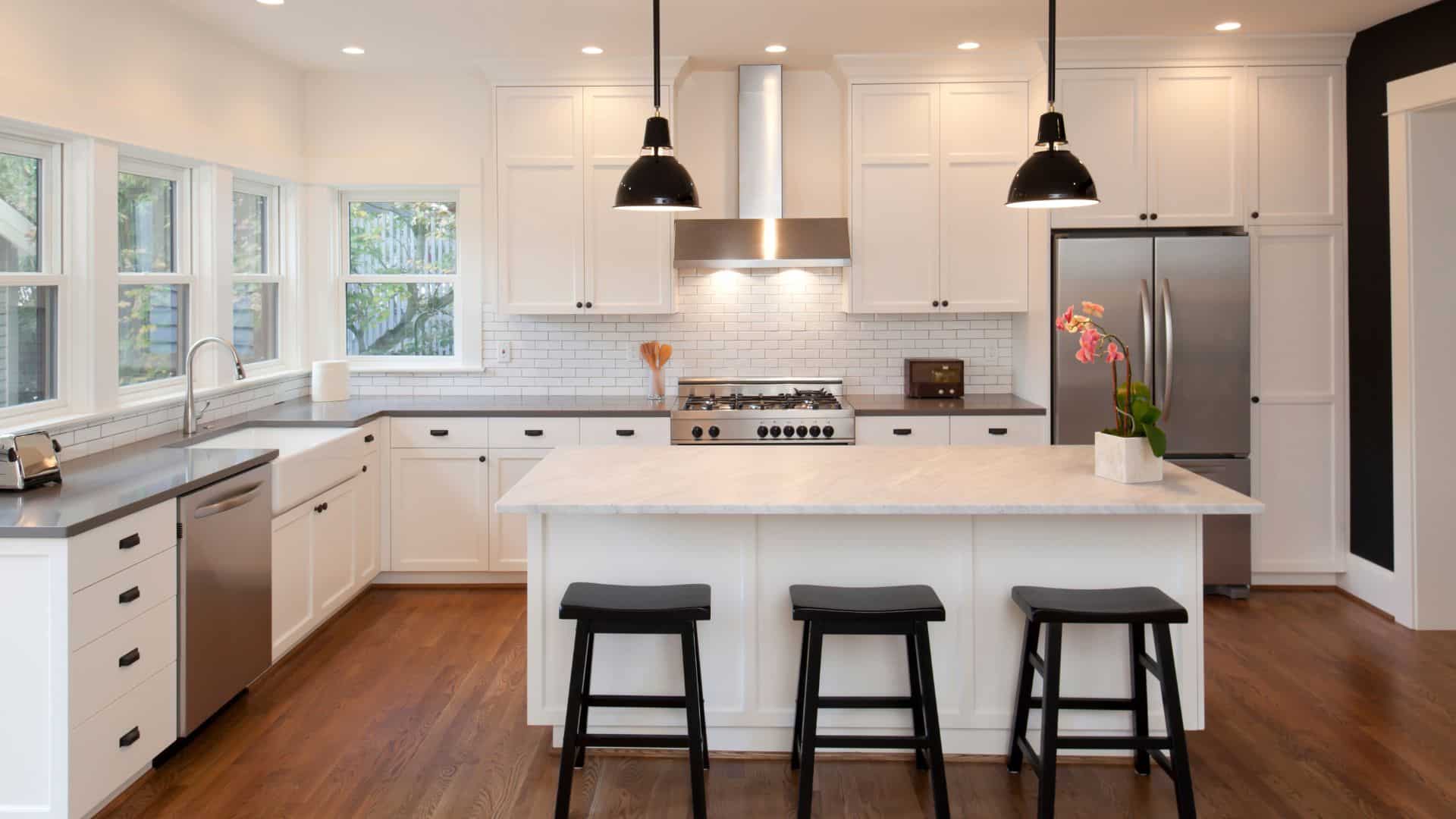 White kitchen design with quartz countertop
