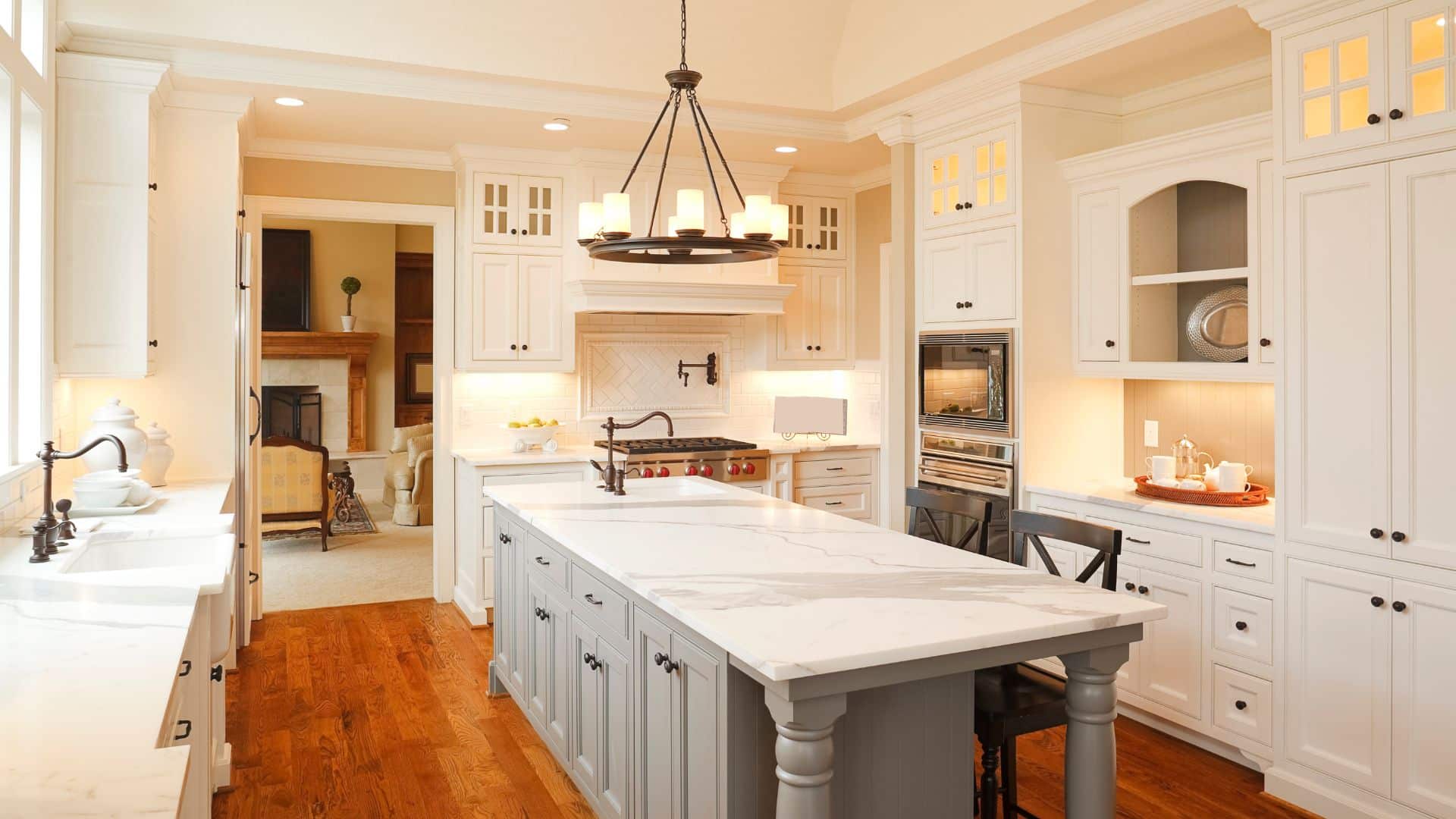 Gold deal white kitchen design with quartz countertop