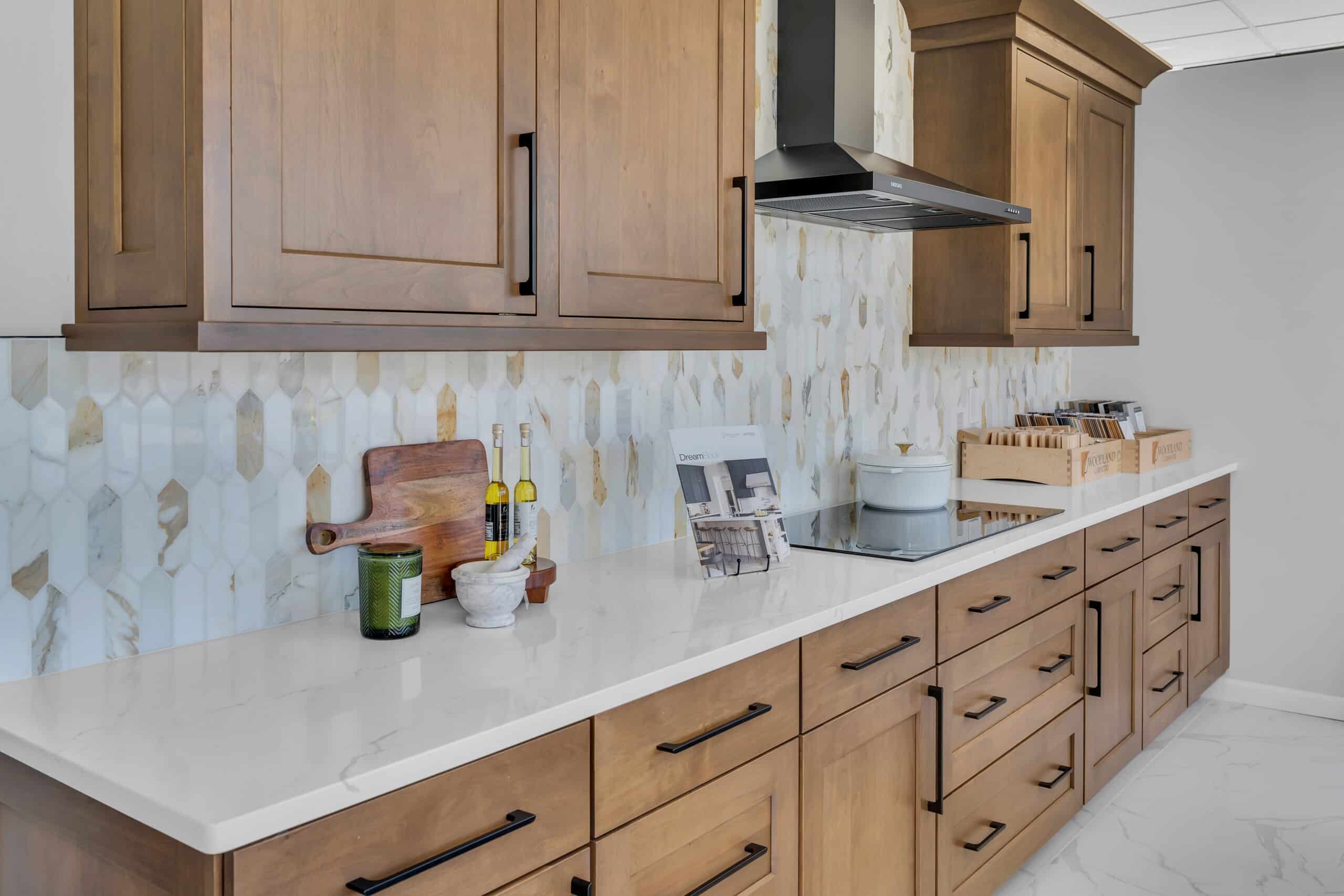 Brown kitchen cabinet with white countertop kitchen design