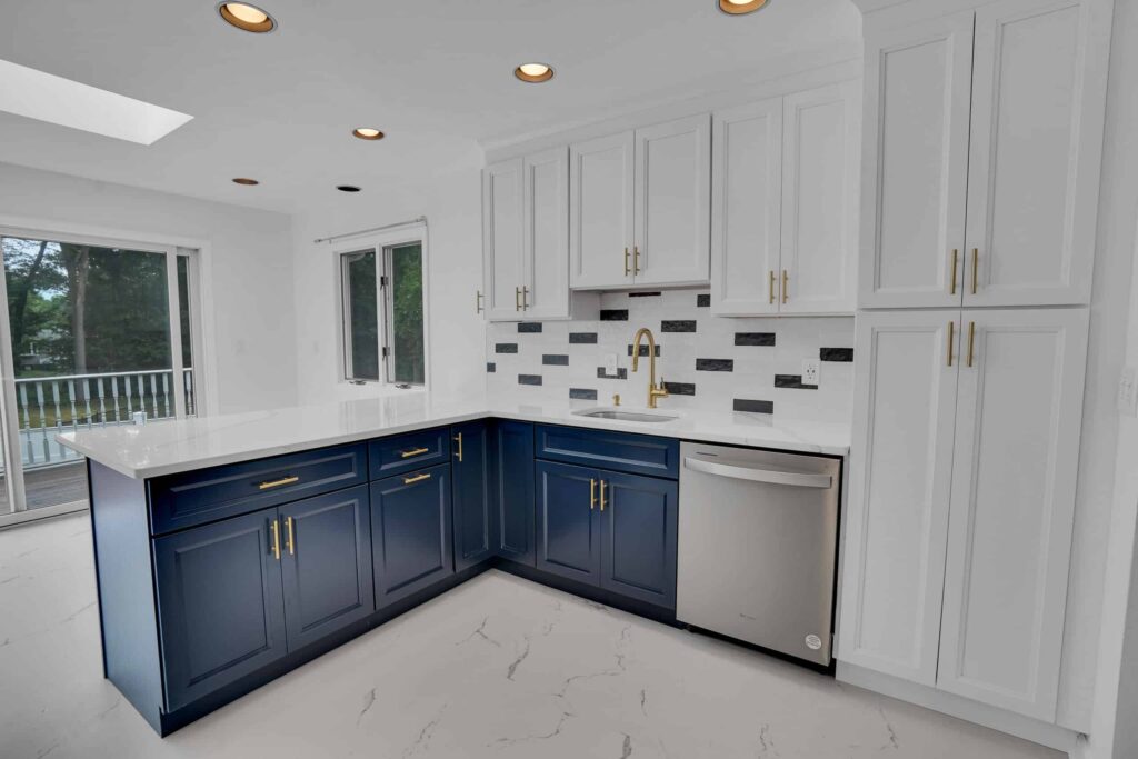 White and Blue Kitchen design with L-Shape shaker cabinets and elegant backsplash