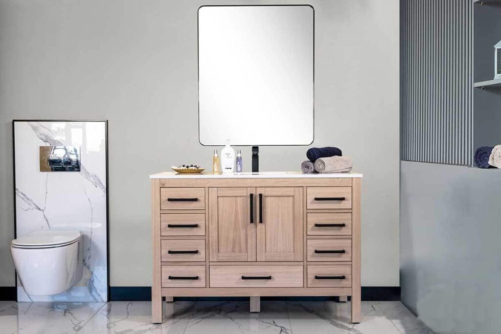 Brown free-standing vanity on gray bathroom