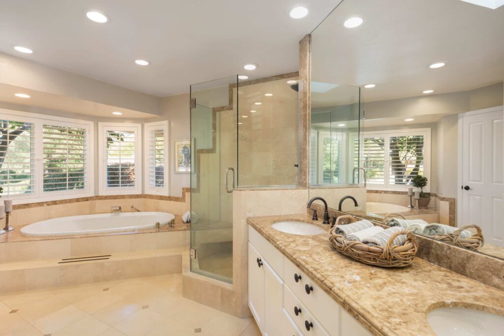 Luxury bathroom style with double sink vanity, shower and bath tub