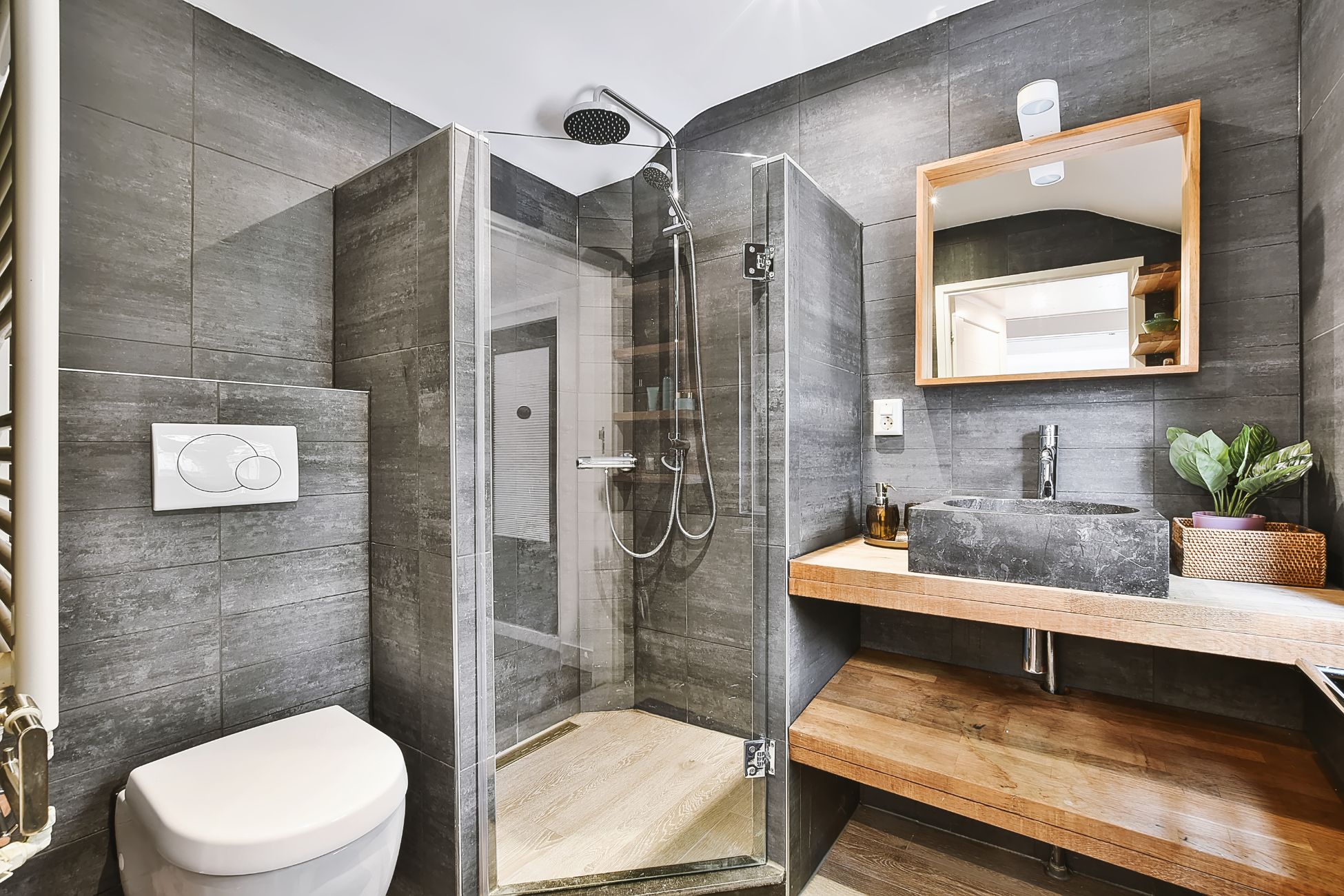 Modern grey bathroom with neo-angle shower