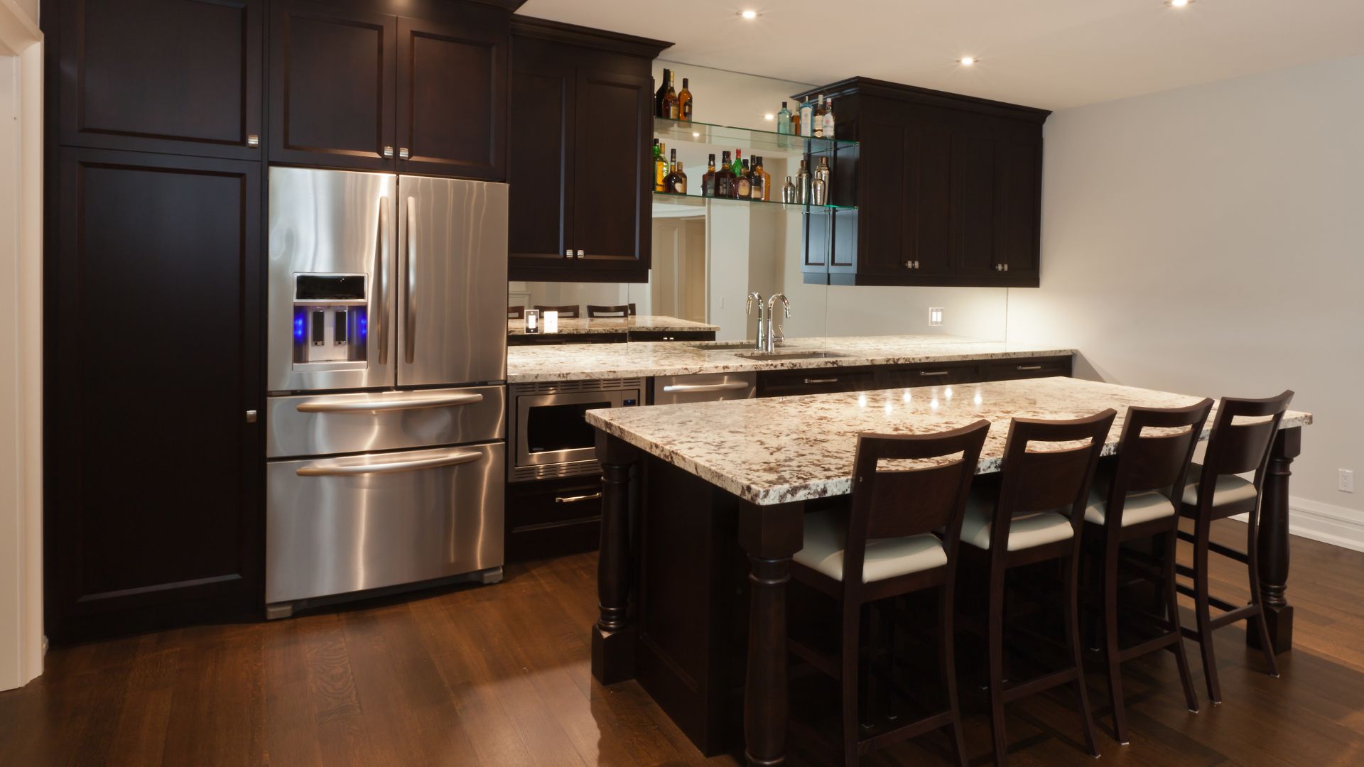 Luxury basement kitchen style in dark brown cabinets and granite countertop