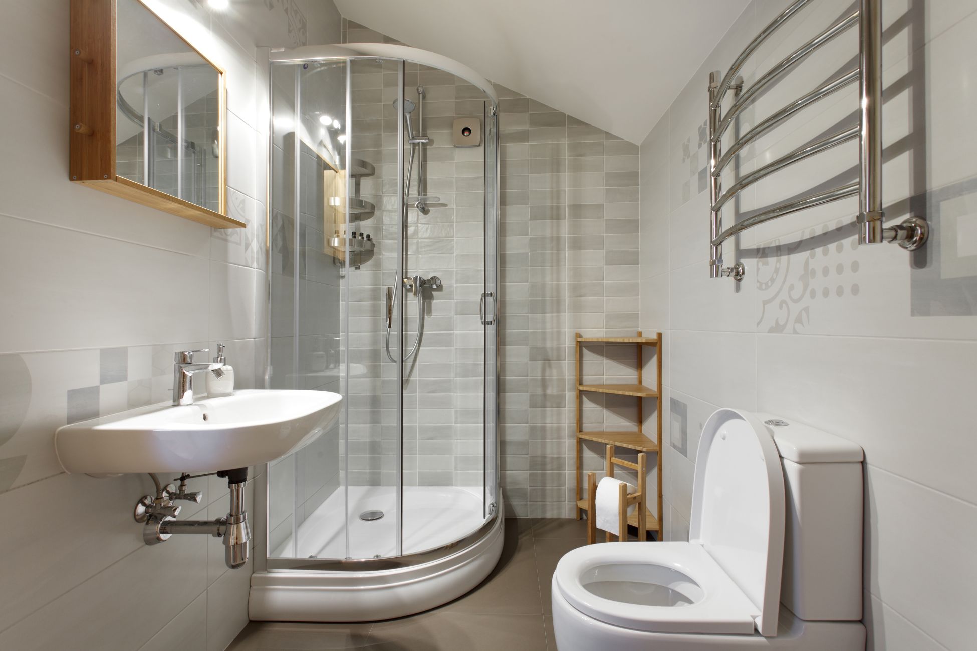 Small Bathroom with curved enclosure shower