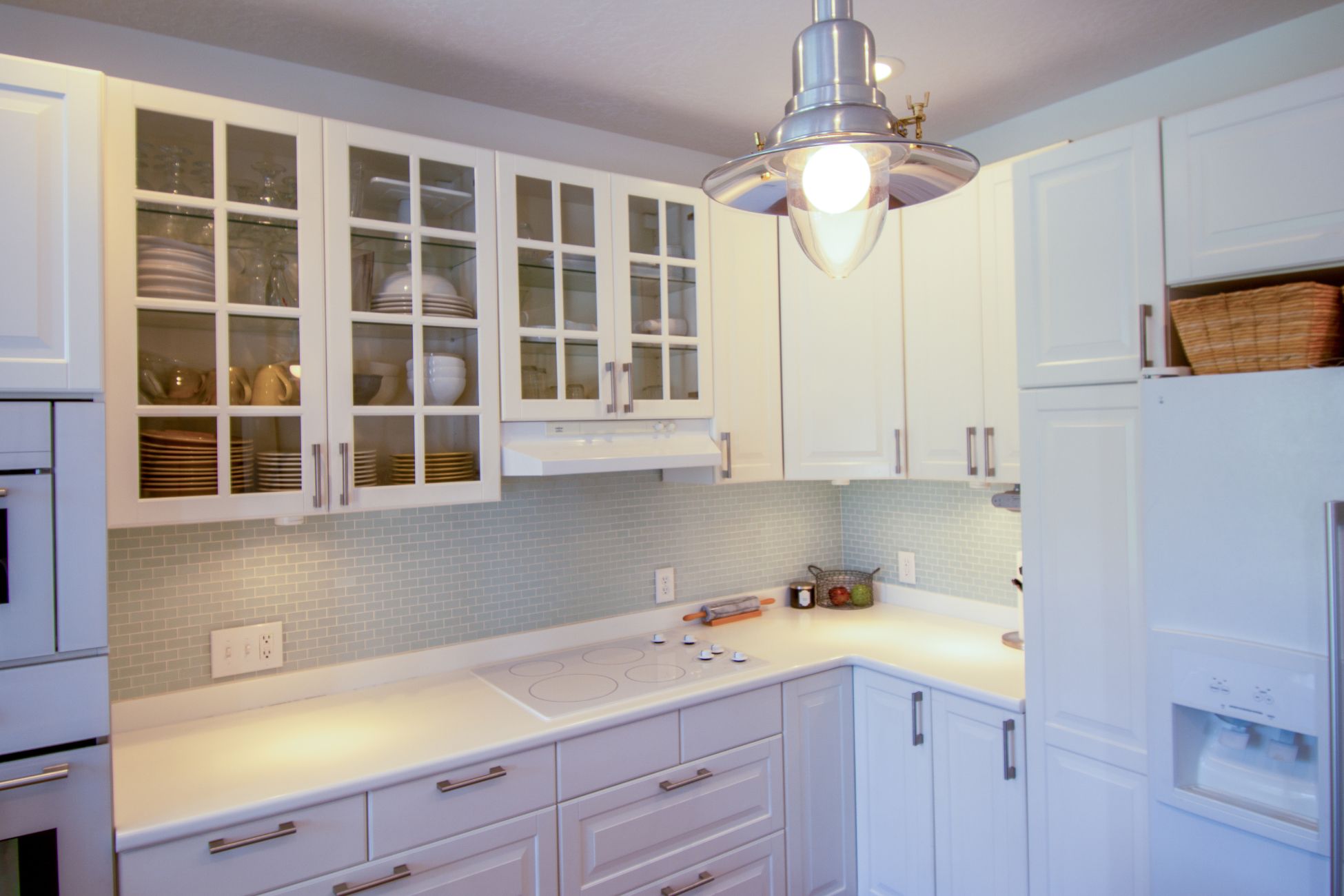 Small white kitchen with custom kitchen cabinets