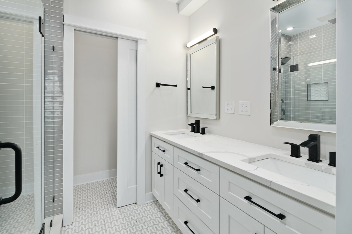 Modern bathroom with white shaker cabinet and white countertop
