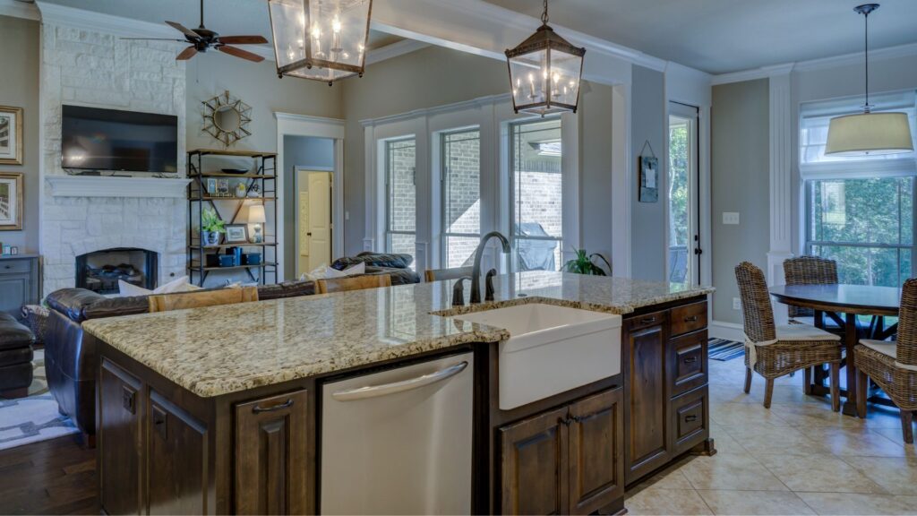 Traditional kitchen style in dark brown cabinet and granite countertop