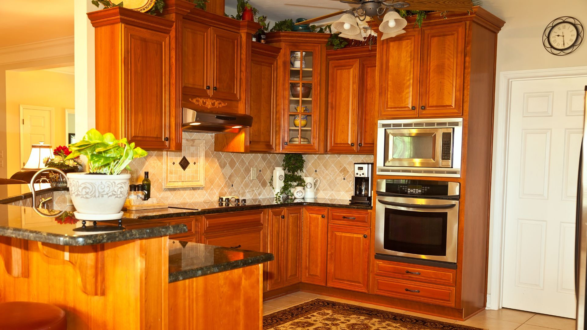 Traditional kitchen style in maple cabinet and granite countertop