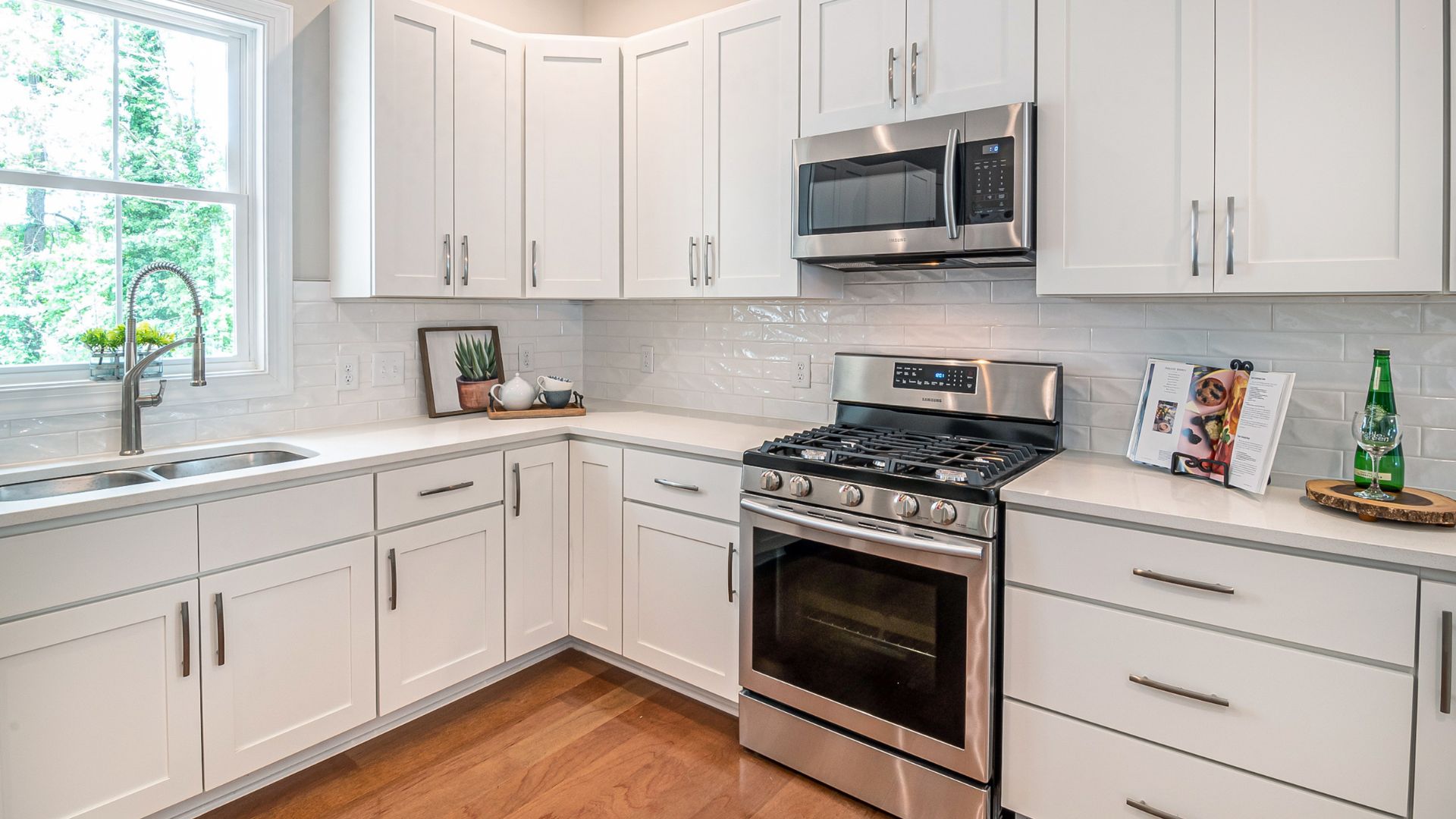 White Base Kitchen Cabinets with white countertop