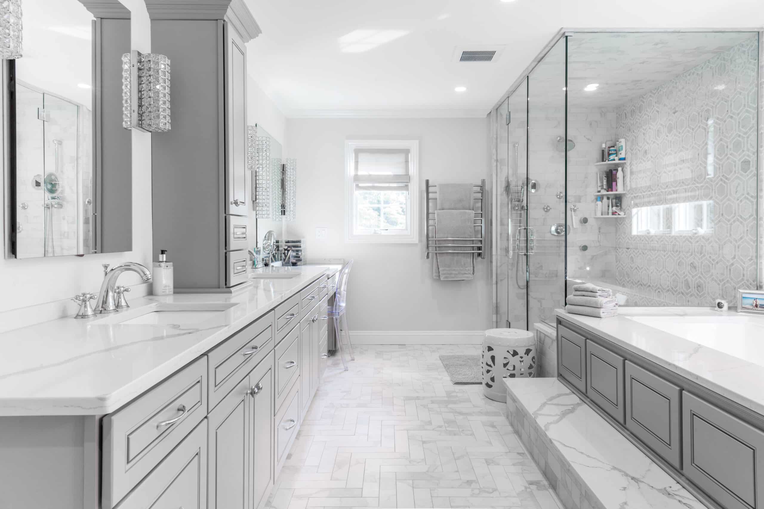Modern White and grey bathroom with corner enclosure shower