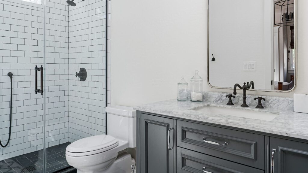 Small bathroom style with traditional grey bathroom cabinets