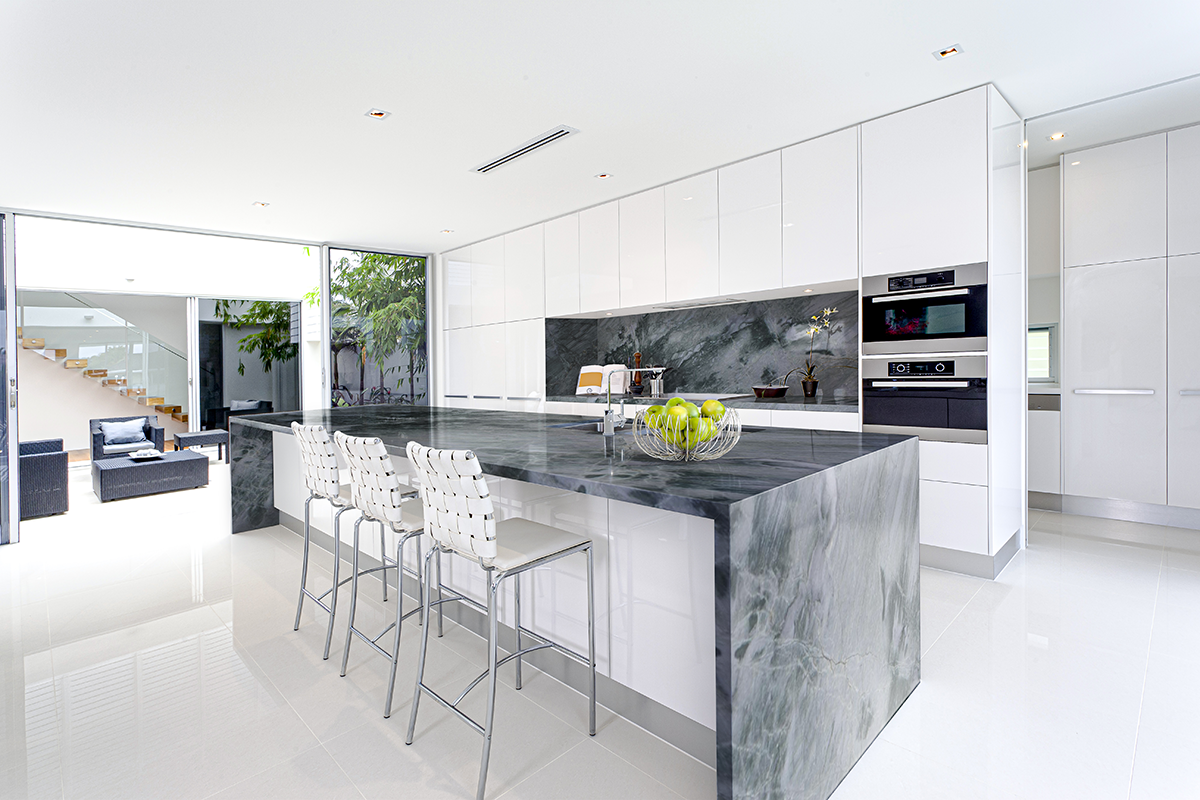Elegant White kitchen with Quartzite Countertop on Kitchen island