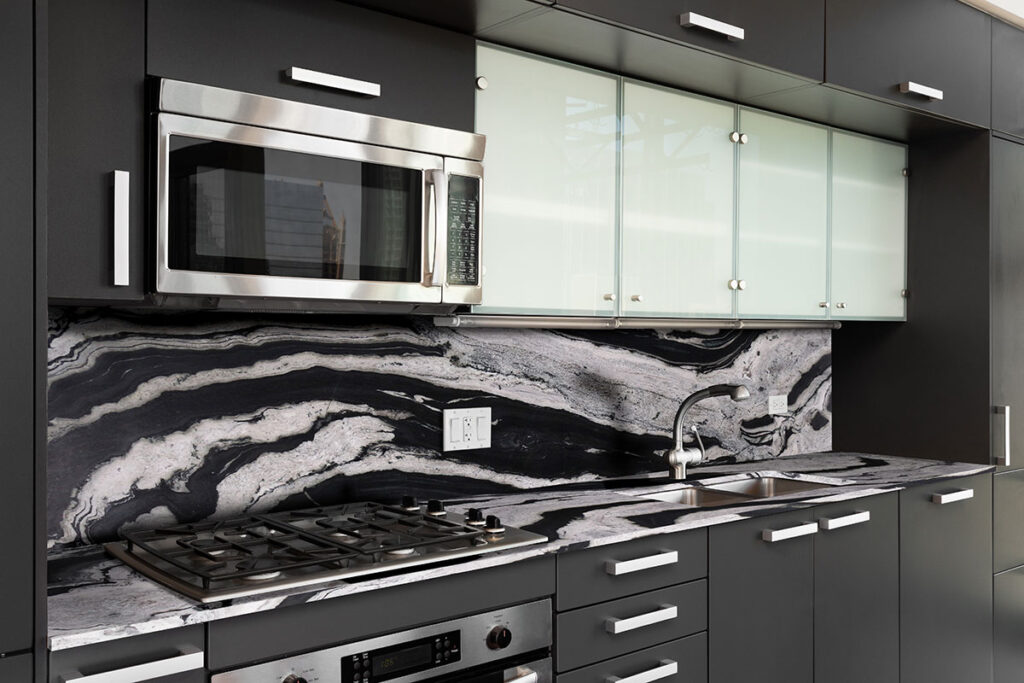Luxury kitchen with Granite countertop and backsplash