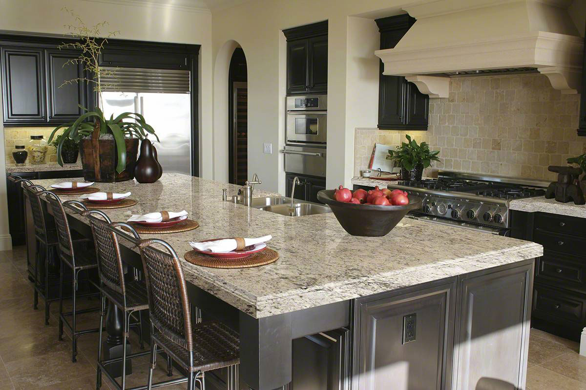 Luxury kitchen with snowfall granite countertop