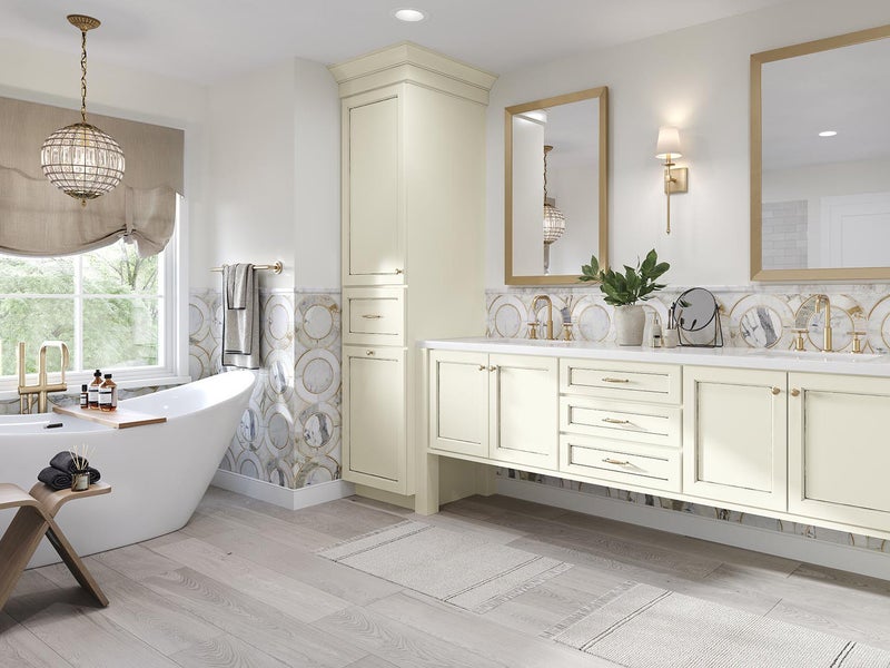 Traditional bathroom with cream cabinet and large bath tub