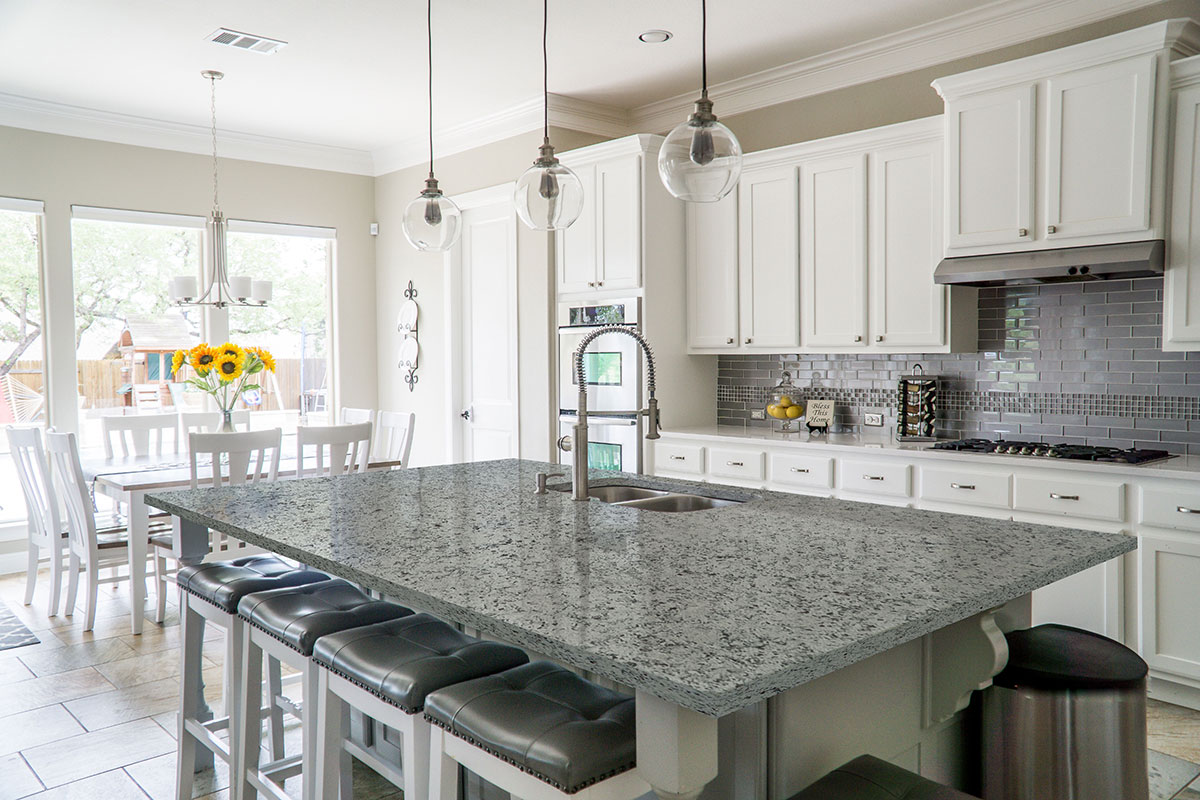 Elegant kitchen with white napoli granite stone