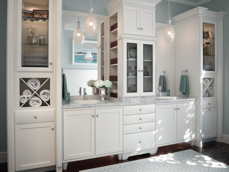 Traditional bathroom white cabinets and countertop