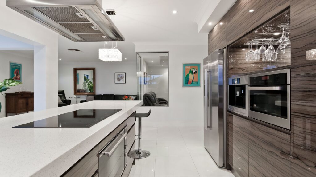 Modern kitchen style in white countertop and brown cabinets