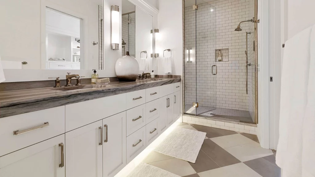Relaxing bathroom feel with shower and double sink white bathroom cabinets