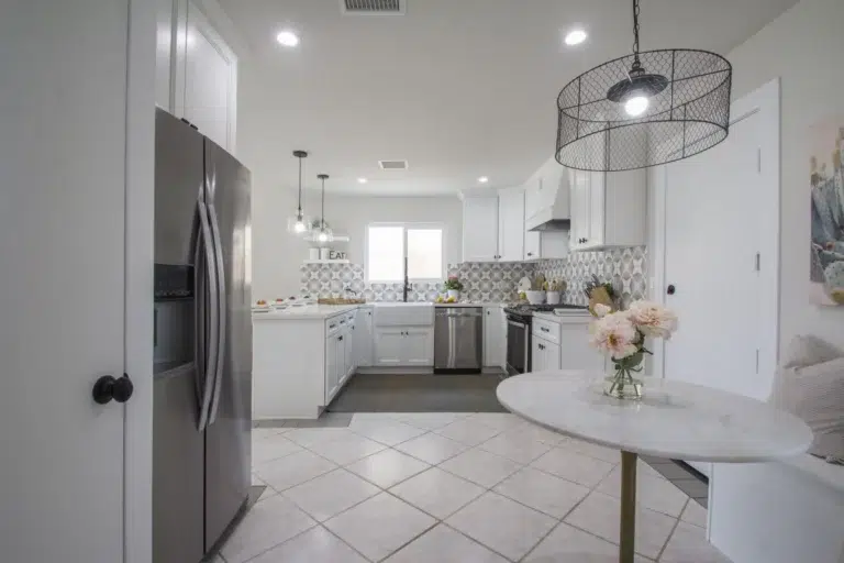 Forevermark White Kitchen design with Uptown Cabinets