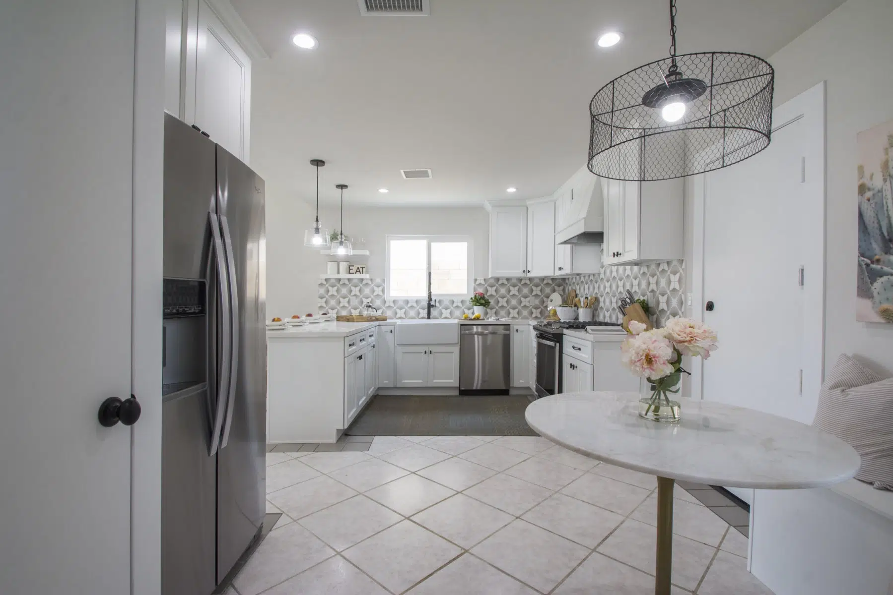 Forevermark White Kitchen design with Uptown Cabinets