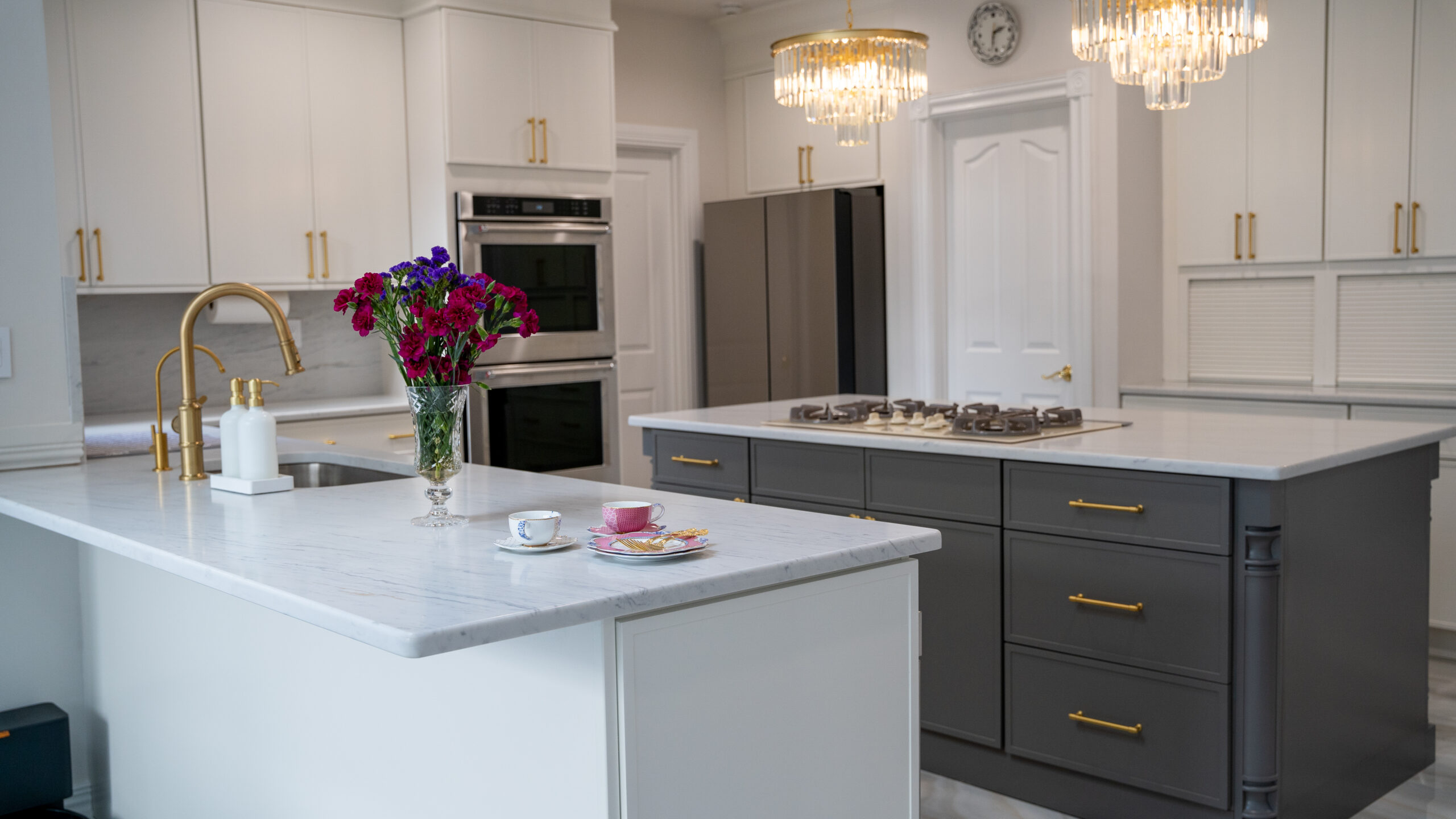 white and grey kitchen style with white countertop