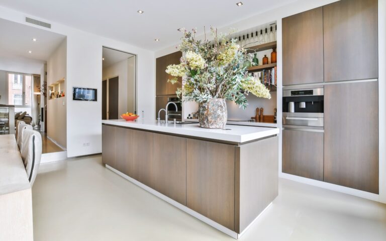 Elegant kitchen with brown cabinets and white countertop