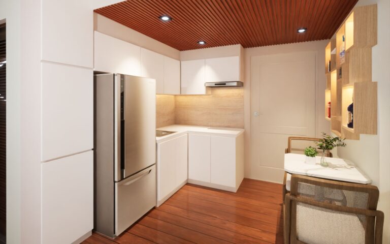 Small kitchen design with white cabinets and wood flooring