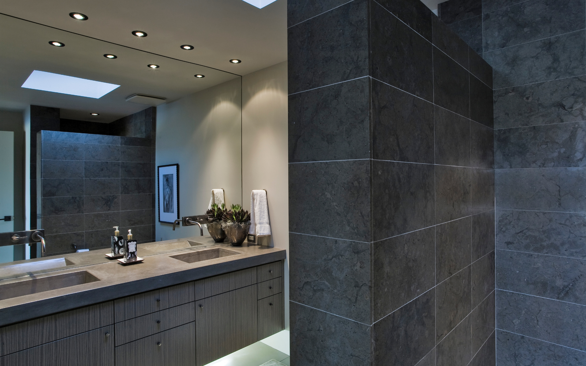 Luxurious, modern bathroom with gray vanity