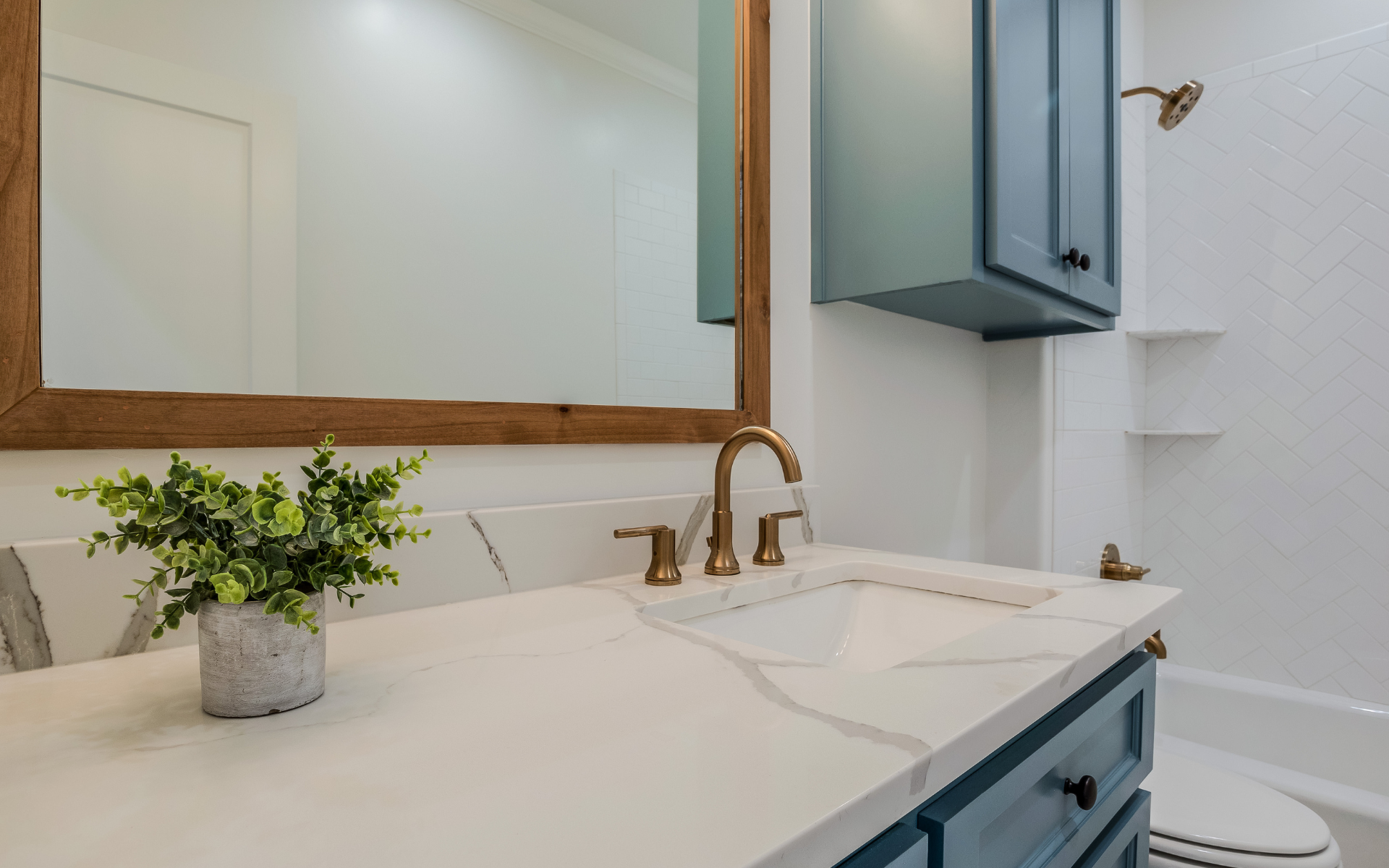 Blue-gray vanity with white countertop