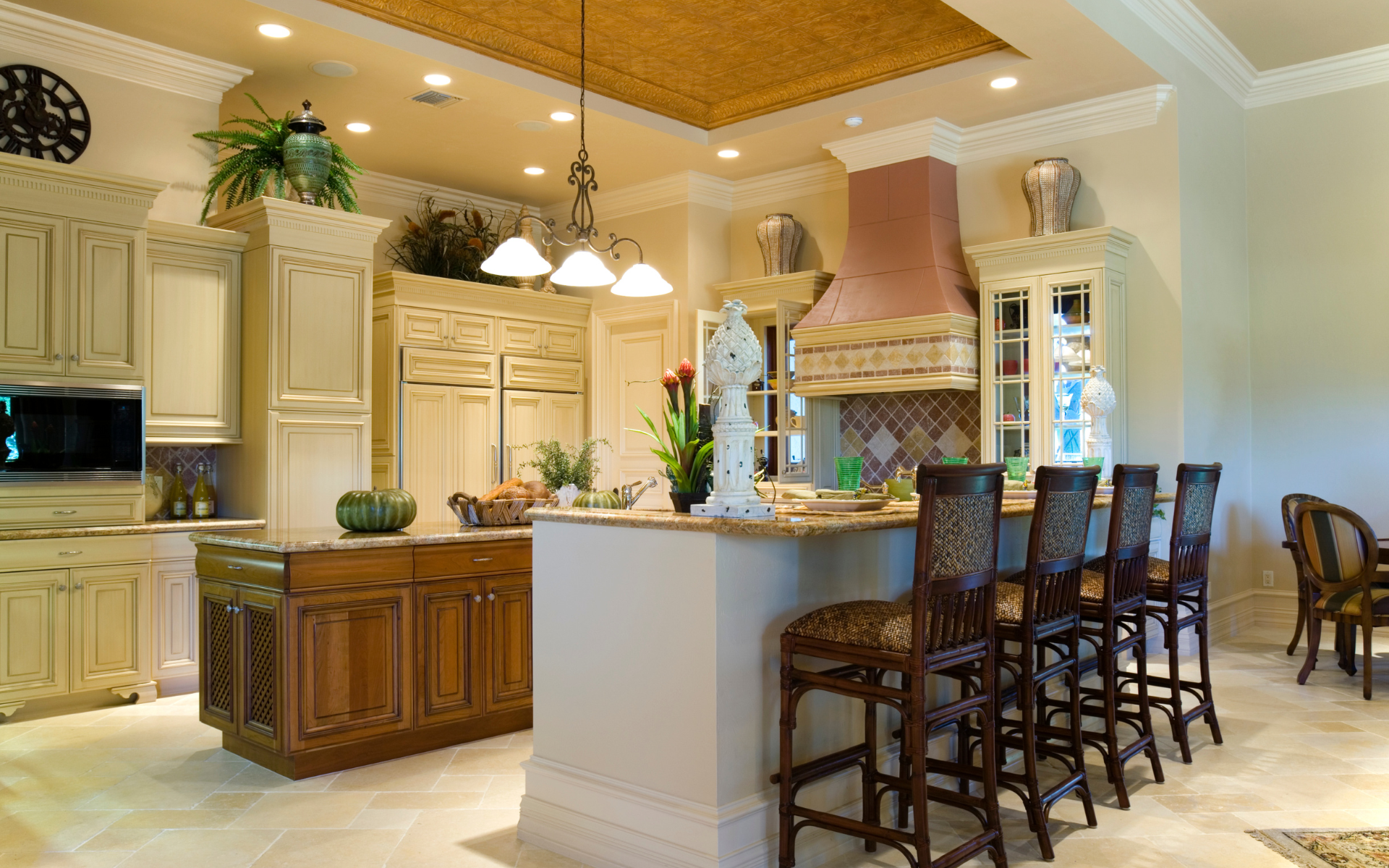 Transitional style kitchen with raised panel cabinets